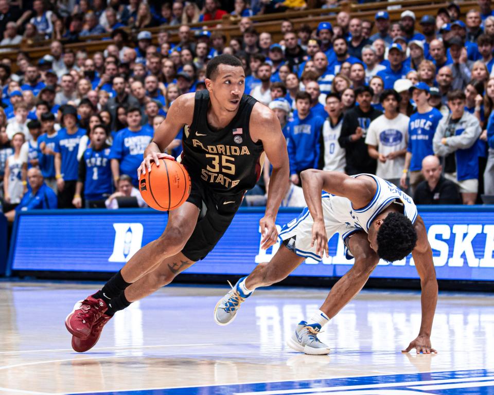 Florida State guard Matthew Cleveland beats his defender on the dribble in an 86-67 loss at Duke on Dec. 21, 2022.