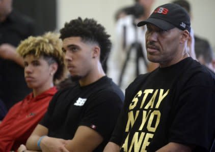 June 23, 2017; Los Angeles, CA, USA;  LaVar Ball the father of newly drafted Los Angeles Lakers player Lonzo Ball with sons LaMelo Ball and LiAngelo Ball in attendance at Toyota Sports Center. Mandatory Credit: Gary A. Vasquez-USA TODAY Sports