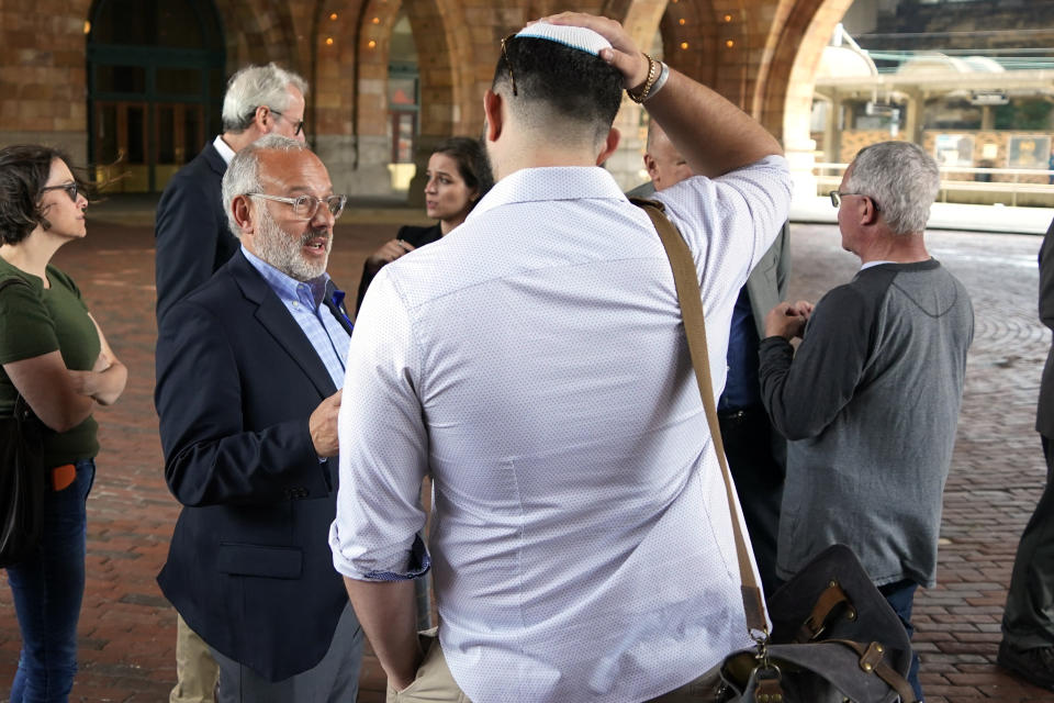 Jeffrey Finkelstein, CEO of the Jewish Federation of Pittsburgh, second from left, is interviewed after Robert Bowers was found guilty, Friday, June 16, 2023, in Pittsburgh. Bowers, a truck driver who spewed hatred of Jews, was convicted Friday of barging into a Pittsburgh synagogue on the Jewish Sabbath and fatally shooting 11 congregants in an act of antisemitic terror for which he could be sentenced to die. (AP Photo/Gene J. Puskar)