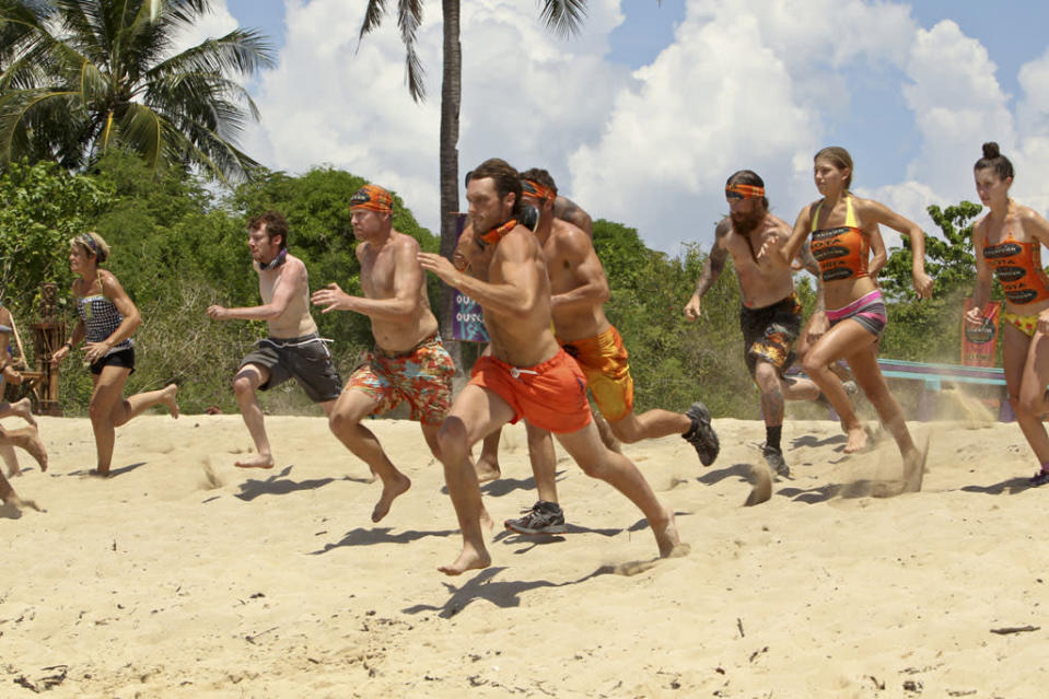 "There's Gonna be Hell to Pay" - Reynold Toepfer and Michael Snow lead the charge for the Gota Tribe during the Immunity Challenge on the third episode of "Survivor: Caramoan - Fans vs. Favorites."