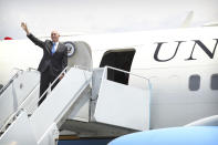 U.S. Vice President Mike Pence waves as he arrives at Jacksons International Airport in Port Moresby, Papua New Guinea, Saturday, Nov. 17, 2018. (AP Photo/Mark Schiefelbein)