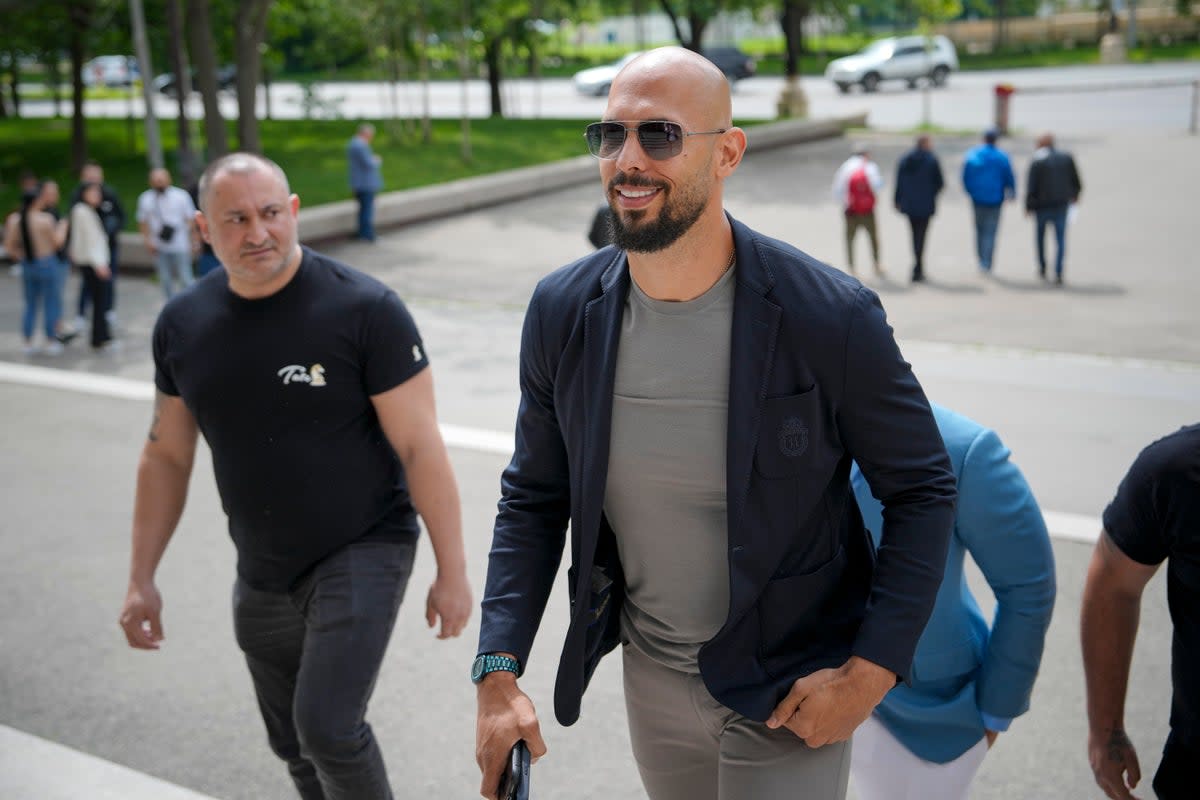 Andrew Tate arrives at the Bucharest Tribunal in May (AP)