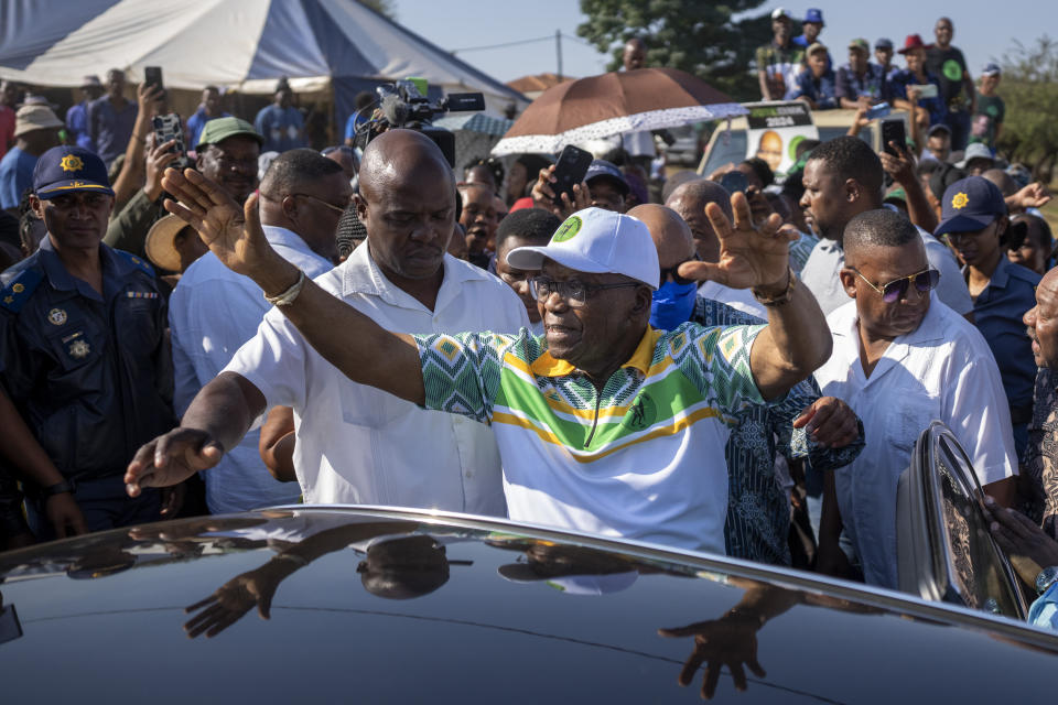 Former president of the A.N.C. and South Africa Jacob Zuma, waves to supporters after casting his ballot on Wednesday May 29, 2024 during general elections in Nkandla, Kwazulu Natal, South Africa. South Africans are voting in an election seen as their country's most important in 30 years, and one that could put them in unknown territory in the short history of their democracy, the three-decade dominance of the African National Congress party being the target of a new generation of discontent in a country of 62 million people — half of whom are estimated to be living in poverty. (AP Photo/Emilio Morenatti)