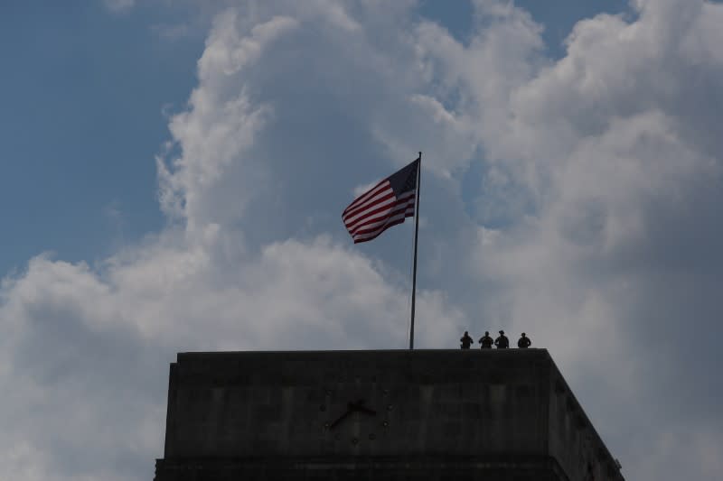 Security officials watch rally against death in Minneapolis police custody of George Floyd atop City Hall in Houston