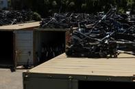 Some of the thousands of BIRD scooters are shown at Scoot Scoop after the company impounded the devices when contracted by private property owners who no longer want them being left on their property in San Diego, California