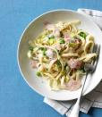 <p>This creamy pasta can be whipped up in 30 minutes or less — perfect for your crazy schedule between Christmas and New Year's.</p><p><a href="https://www.womansday.com/food-recipes/food-drinks/recipes/a11971/creamy-pasta-with-leeks-peas-and-ham-recipe/" rel="nofollow noopener" target="_blank" data-ylk="slk:Get the recipe for Creamy Pasta with Leeks, Peas & Ham.;elm:context_link;itc:0;sec:content-canvas" class="link "><em>Get the recipe for Creamy Pasta with Leeks, Peas & Ham.</em></a></p>