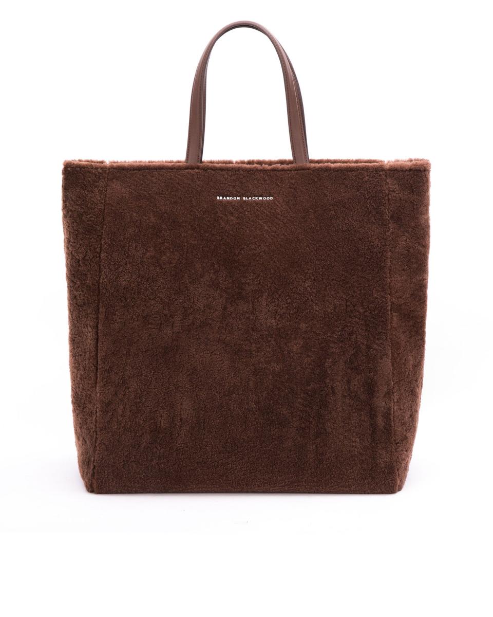 <p><a href="https://brandonblackwood.com/products/morell-tote-brown-shearling" rel="nofollow noopener" target="_blank" data-ylk="slk:Shop Now;elm:context_link;itc:0;sec:content-canvas" class="link ">Shop Now</a></p><p>Morell Tote</p><p>brandonblackwood.com</p><p>$250.00</p>