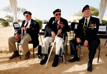 British World War Two veterans Alex Munro, 96, Joe Peel, 98, and Bill Blackburn,98, attend a ceremony for the anniversary of the Battle of El Alamein, at El Alamein war cemetery in Egypt, October 20, 2018. REUTERS/Amr Abdallah Dalsh