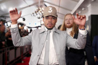 <p>Chance the Rapper wore his signature “3” baseball hat on the red carpet. (Photo: Getty Images) </p>