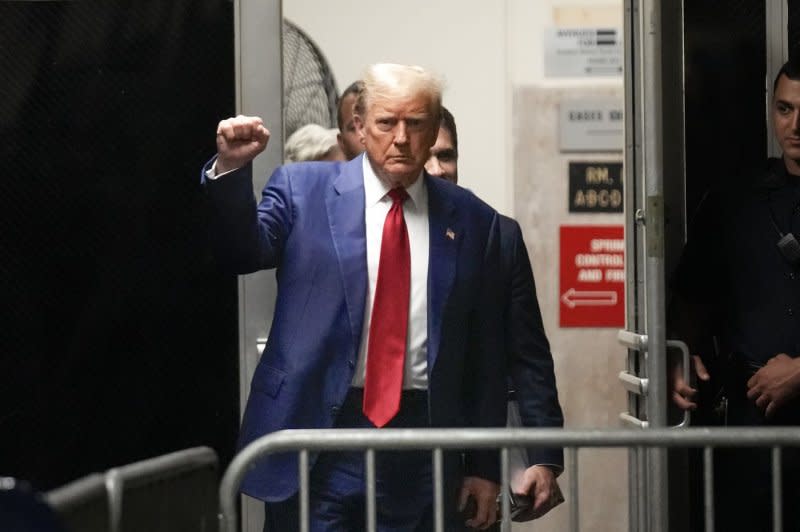 Former President Donald Trump returns to the courtroom after a lunch break in his criminal trial at Manhattan, New York Criminal Court on Tuesday. The former president reportedly fell asleep multiple times during the day. Pool Photo by Seth Wenig/UPI