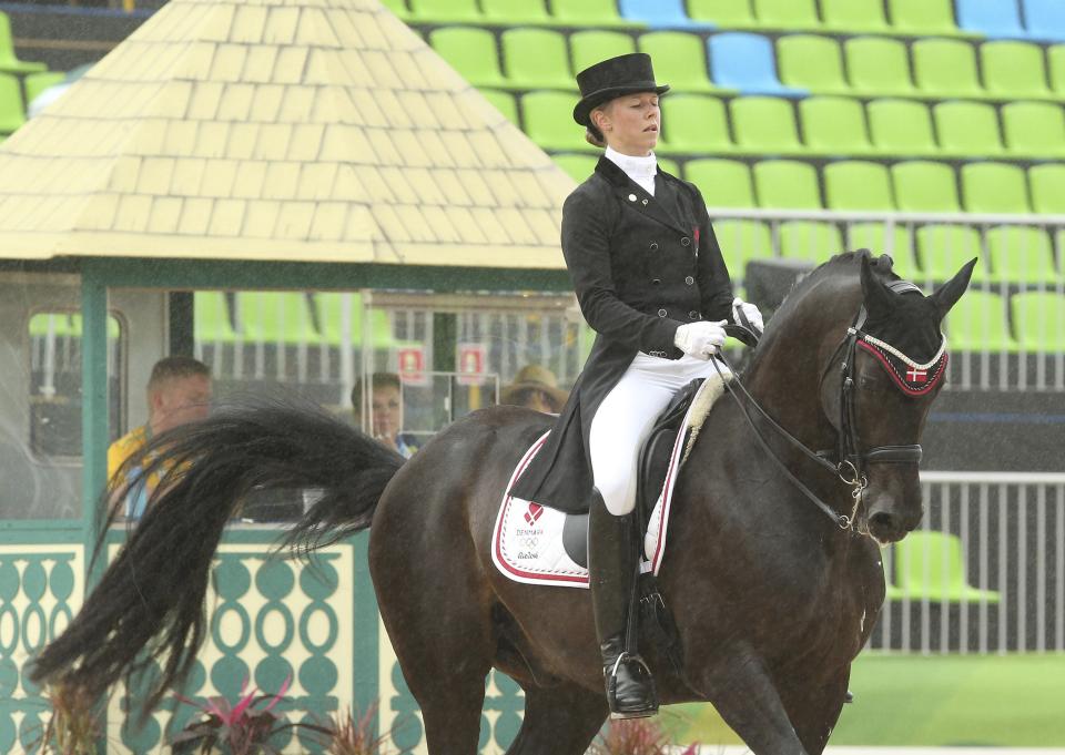 Agnete Kirk Thinggaard (DEN) of Denmark riding Jojo Az competes. 