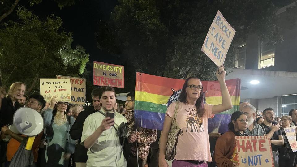 People protest against the same-sex man at Cumberland libraries outside Cumberland Council at Merrylands.