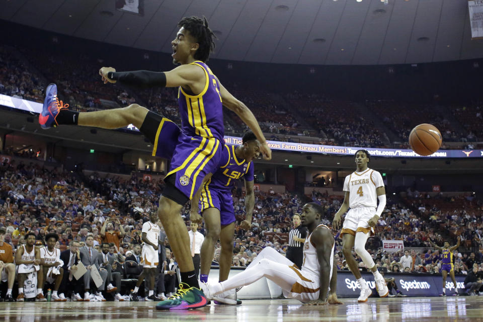 LSU forward Trendon Watford (2) celebrates after he scored over Texas guard Courtney Ramey (3) during the first half of an NCAA college basketball game, Saturday, Jan. 25, 2020, in Austin, Texas. (AP Photo/Eric Gay)