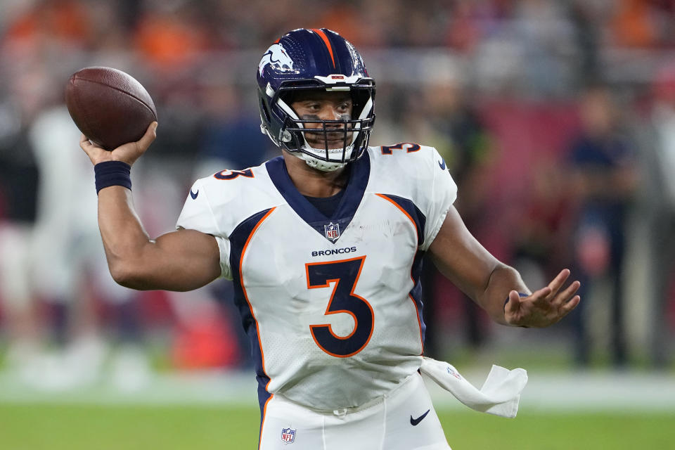 Denver Broncos quarterback Russell Wilson (3) passes against the Arizona Cardinals during the first half of an NFL preseason football game in Glendale, Ariz., Friday, Aug. 11, 2023. (AP Photo/Matt York)