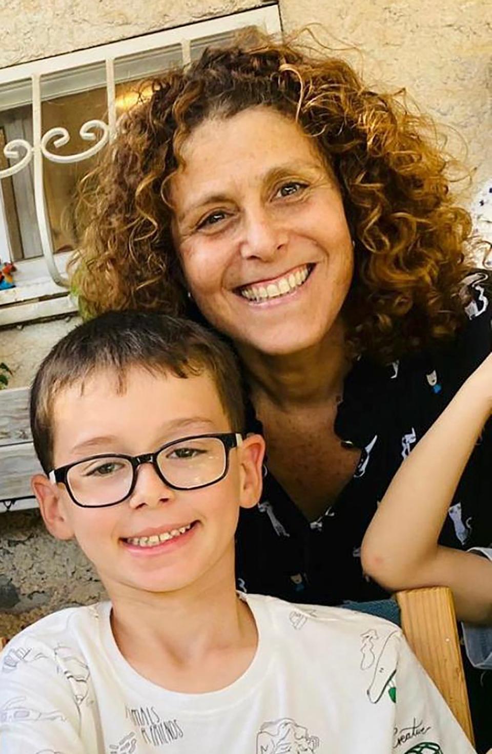 Keren Munder and her nine-year-old son Ohad, who were among those freed after seven weeks (AP)