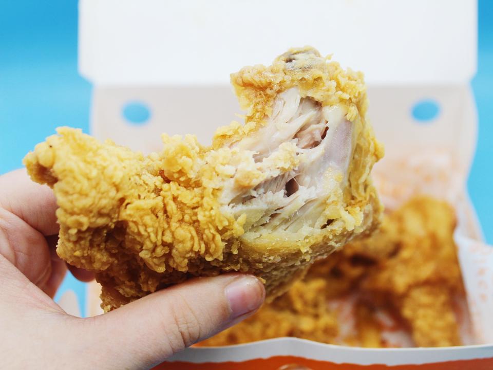 popeyes box with fried chicken thigh