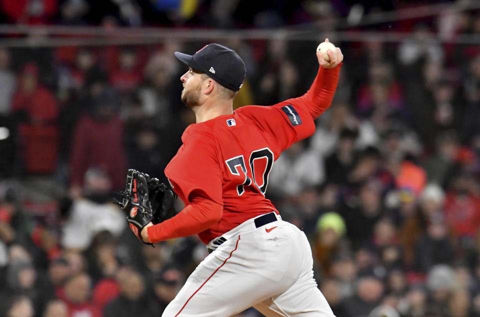 Boston Red Sox relief pitcher Ryan Brasier throws to a Minnesota Twins batter during the sixth inning of a baseball game at Fenway Park, Wednesday, April 19, 2023, in Boston. (AP Photo/Mark Stockwell)