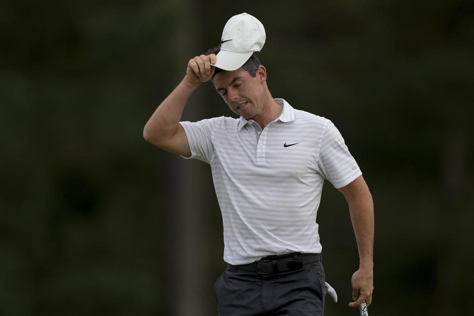 Rory McIlroy, of Northern Ireland, takes off his cap after putting on the 18th green during the second round of the Masters golf tournament on Friday, April 9, 2021, in Augusta, Ga. (AP Photo/David J. Phillip)