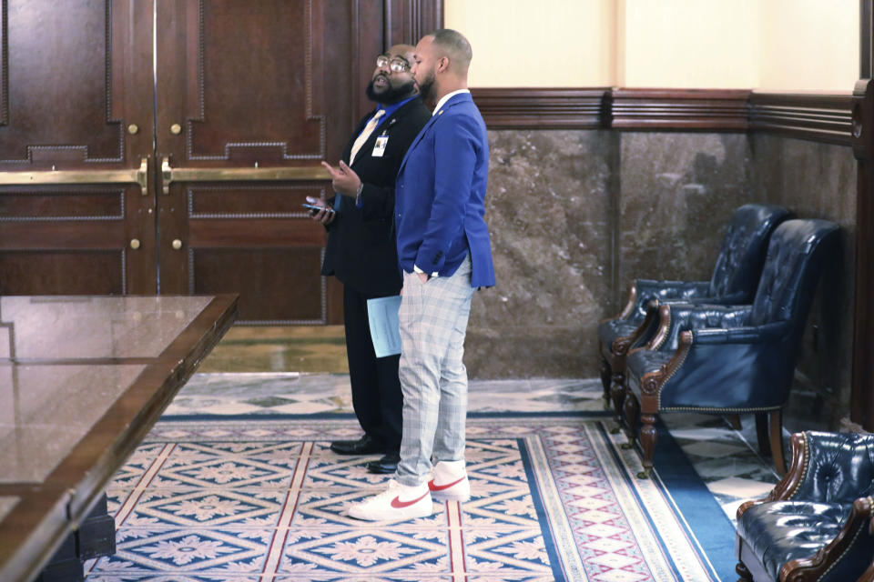 South Carolina Sen. Deon Tedder, North Charleston, wears sneakers in support of the American Cancer Society in the Senate antechamber on Wednesday, Jan. 24, 2024, in Columbia, S.C. (AP Photo/Jeffrey Collins)