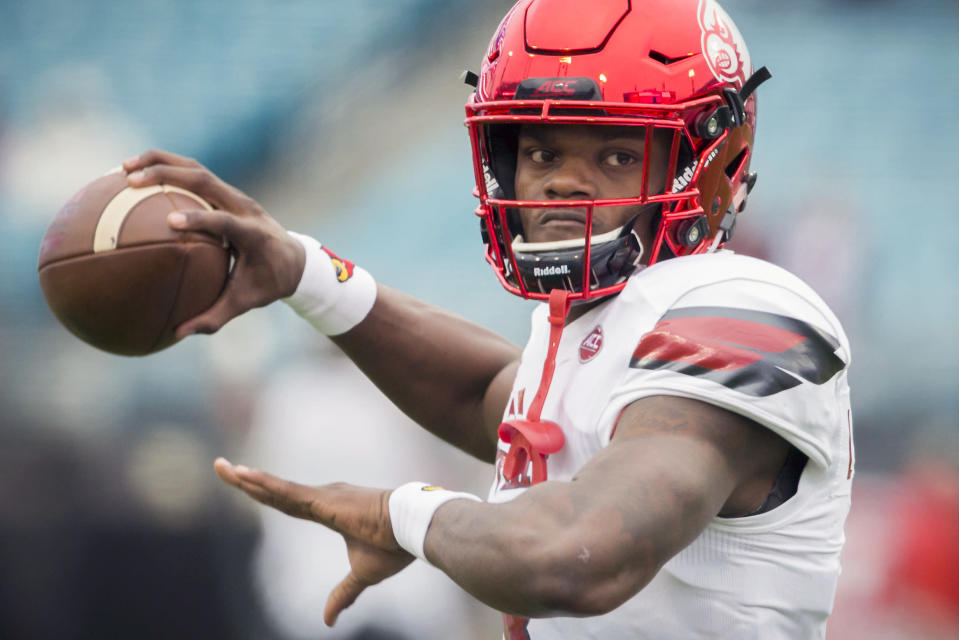 Lamar Jackson rushed for 50 TDs and threw for 69 scores in three seasons at Louisville. (AP) 