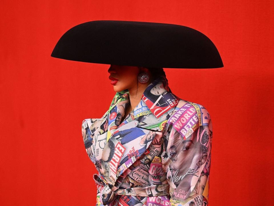 US rapper Cardi B poses for photographs as she presents a creation for Balenciaga during the Women's Spring-Summer 2022 Ready-to-Wear collection fashion show in Paris, as part of the Paris Fashion Week, on October 2, 2021.