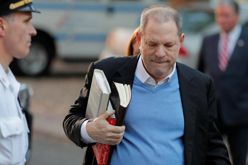 Weinstein: The producer pictured walking into the police station (Reuters)