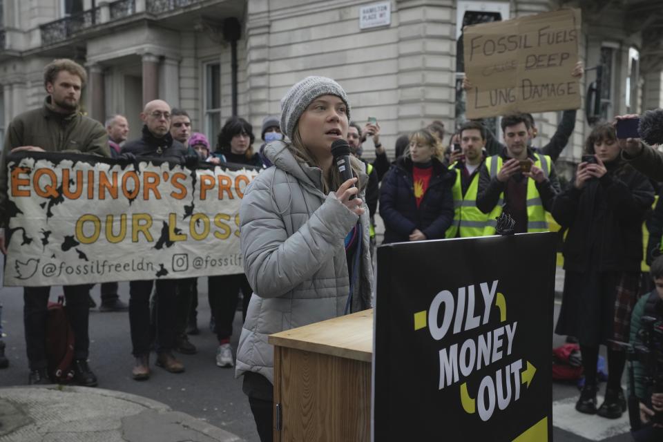 Environmental activist Greta Thunberg delivers a speech outside the Intercontinental Hotel during the Oily Money Out protest, in London, Tuesday, Oct. 17, 2023. (AP Photo/Kin Cheung)