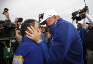 Golf - 2018 Ryder Cup at Le Golf National - Guyancourt, France - September 30, 2018 - Team Europe captain Thomas Bjorn celebrates with Francesco Molinari after winning the Ryder Cup REUTERS/Carl Recine