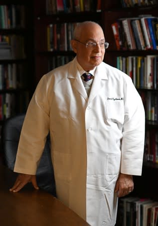 Dr. David Egilman, MD and an expert witness who leaked confidential safety records about Zyprexa and also sought to shine a light on OxyContin poses for a photograph at his office in Attleboro