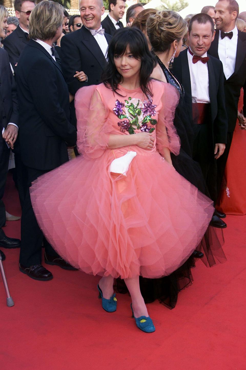 Bjork at the 200 Cannes Film Festival in a pink dress and blue heels.