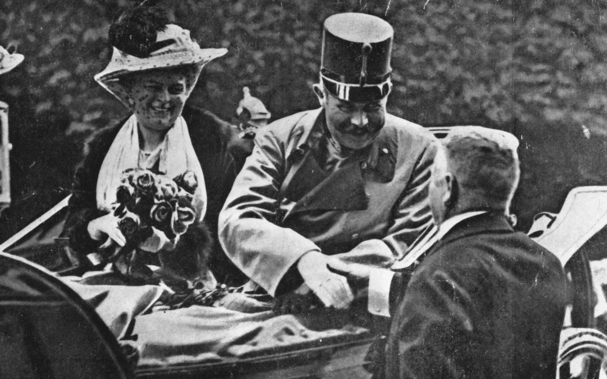 Franz Ferdinand, archduke of Austria, and his wife Sophie riding in an open carriage at Sarajevo shortly before their assassination - Getty