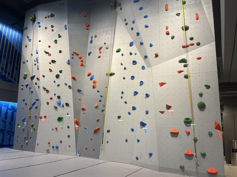 The space features a 22-foot climbing wall with 10 different tracks for different skill levels (Source: Dave Briggs/Yahoo Finance)