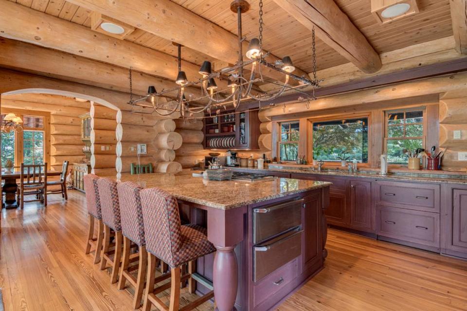 The kitchen of a $4.9 million log home for sale in South Carolina