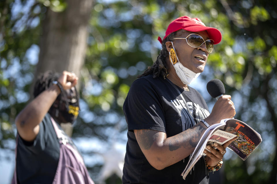 Andrea Jenkins, vice president of the Minneapolis City Council, speaks to community members at "The Path Forward" meeting at Powderhorn Park, a meeting between Minneapolis City Council and community members Sunday, June 7, 2020 in Minneapolis. The focus of the meeting was defunding the Minneapolis Police Department. (Jerry Holt/Star Tribune via AP)
