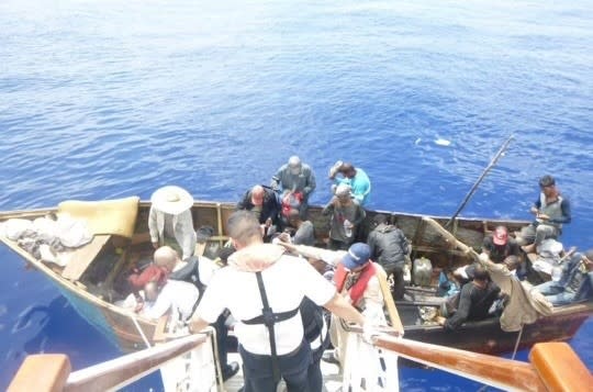 Carnival team members rescue vessel adrift at sea. Courtesy of Carnival