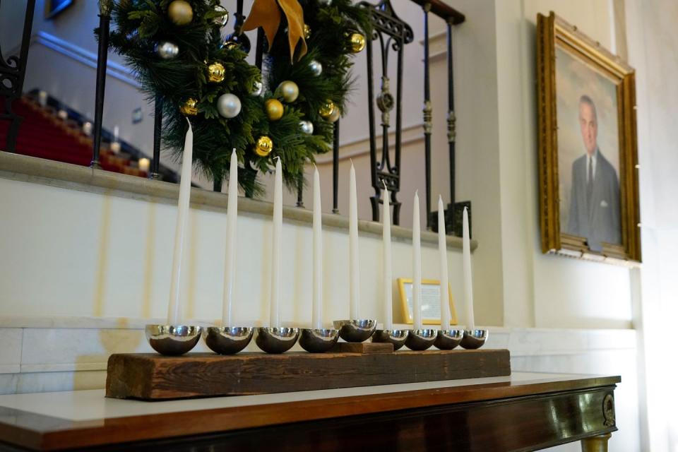 mandatory credit photo by patrick semanskyapshutterstock 13640794f menorah that was built by white house carpenters from wood that was removed during a truman era renovation is on display in cross hall of the white house during a press preview of holiday decorations at the white house, in washington white house holidays, washington, united states 28 nov 2022