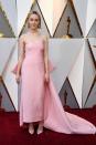 <p>Saoirse Ronan turned heads wearing a very feminine soft pink strapless number with bow detail. This look was a stylist favourite and designed by Calvin Klein by Appointment.</p>