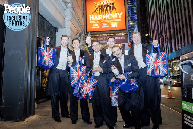 <p>Paul Aphisit / DKC O&M</p> The cast of 'Harmony' with their new 'Six' goodie bags.