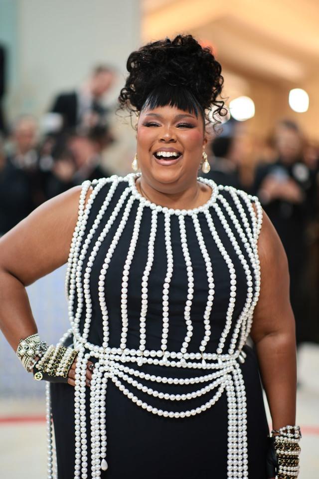 Lizzo Drips in Pearls at the 2023 Met Gala After Critiquing Last Year's Red  Carpet