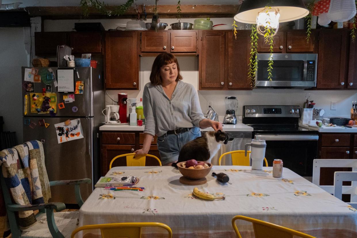 <span>Katy Slininger, a resident of Cargill Falls Mill in Putnam, Connecticut, is part of her building’s tenant union. </span><span>Photograph: Shahrzad Rasekh/CT Mirror</span>