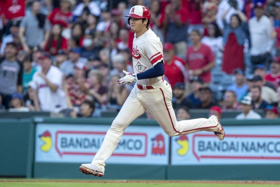 The Angels' Shohei Ohtani runs to second base on an RBI double during the first inning Sept. 17, 2022.