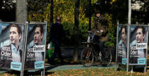 Stickers reading "Thank you!" are seen attached on election campaign posters with Sebastian Kurz of the Peoples' Party (OeVP) in Vienna, Austria, October 16, 2017. REUTERS/Heinz-Peter Bader