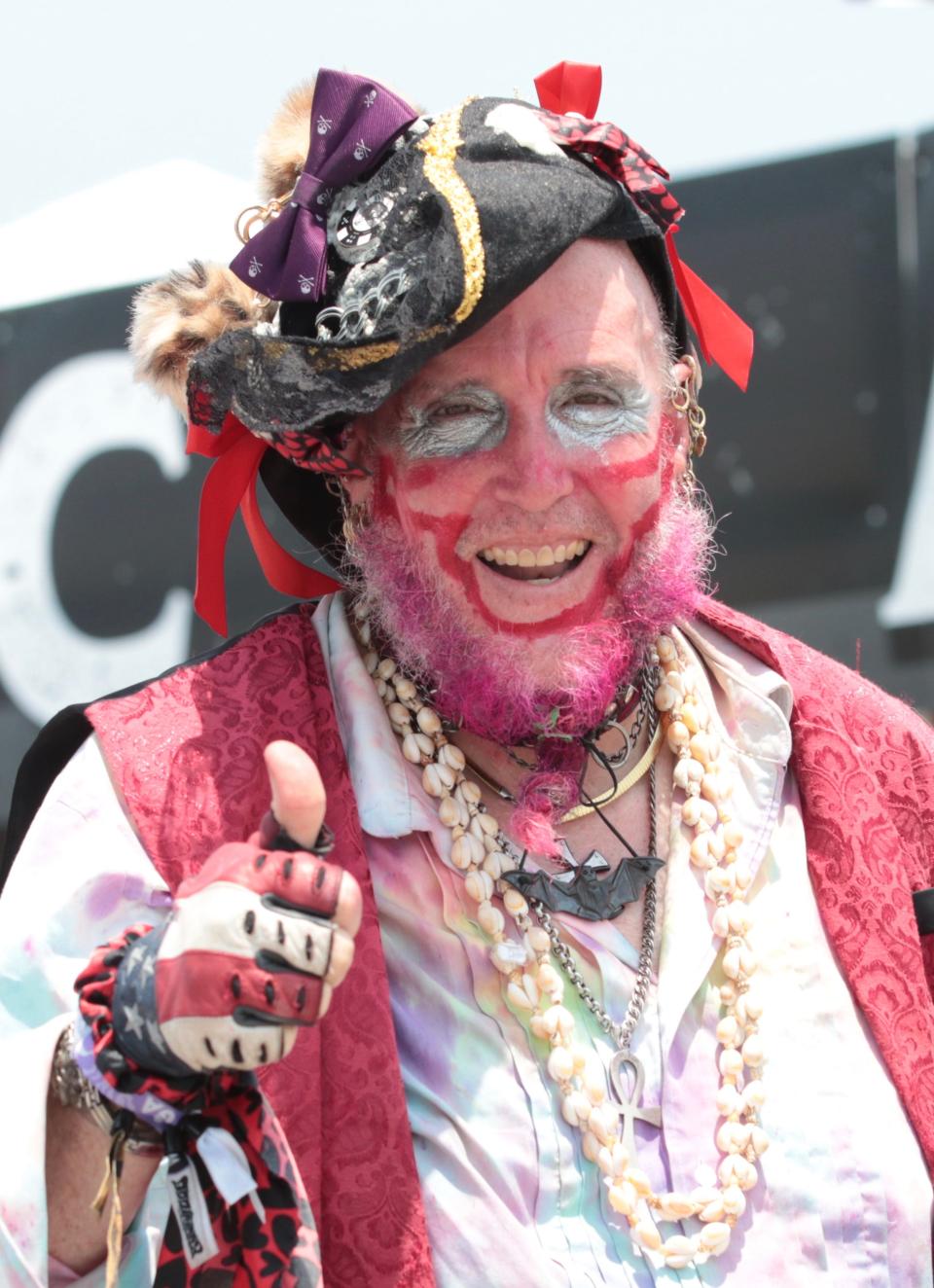 Hal Johnston, of Augusta, Ga., shows off his festival attire, which doubles as "every day" wardrobe at the opening day of the Welcome to Rockville music festival at Daytona International Speedway. "I go around to concerts and have fun," Johnston said.