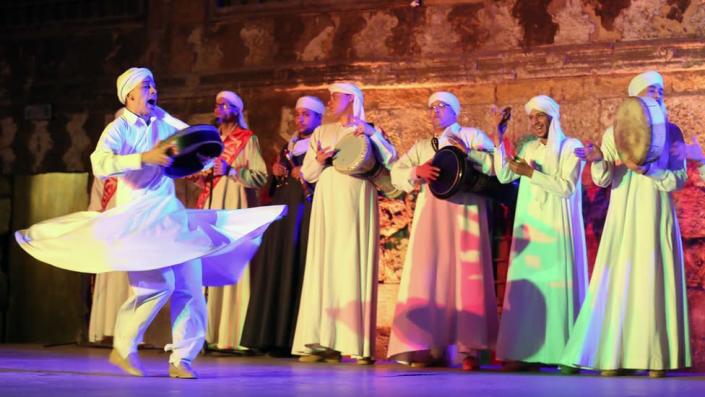 Egyptians members of the "Tanoura Dance Troupe" perform at the Ghouri complex in Cairo, Egypt.