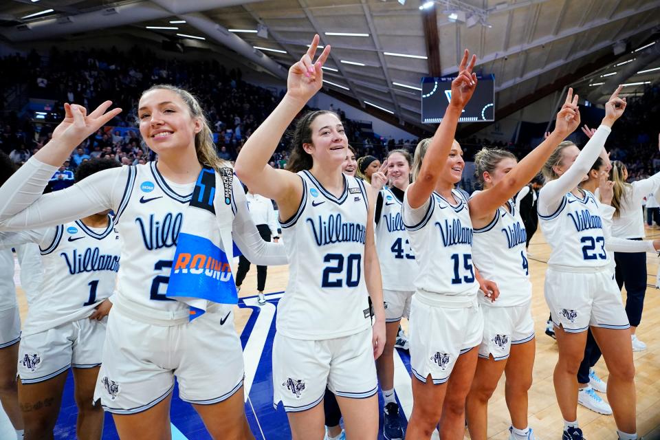 Villanova players including Maddy Siegrist (20) celebrate after beating Cleveland State.