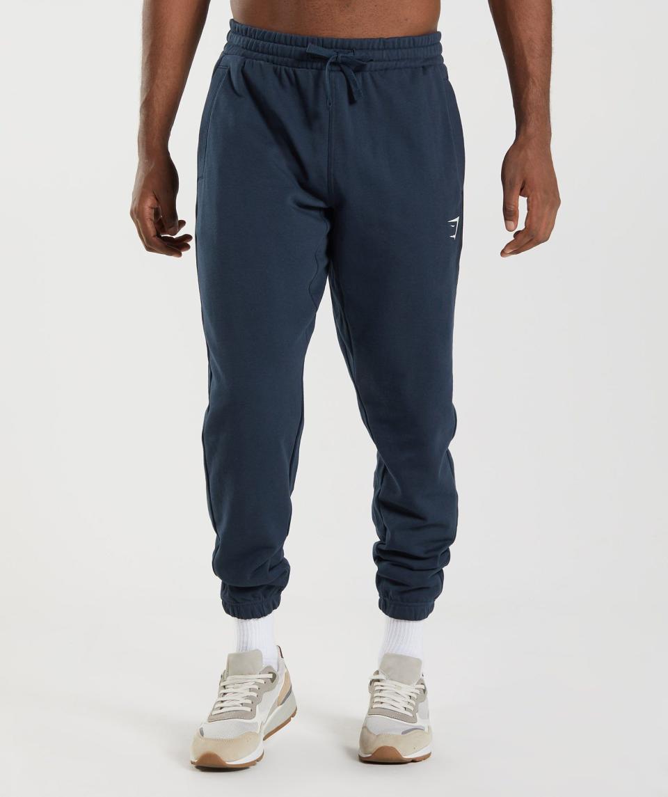 <p><a href="https://go.redirectingat.com?id=74968X1596630&url=https%3A%2F%2Fuk.gymshark.com%2Fproducts%2Fgymshark-essential-oversized-joggers-navy-aw22&sref=https%3A%2F%2F" rel="nofollow noopener" target="_blank" data-ylk="slk:Shop Now;elm:context_link;itc:0;sec:content-canvas" class="link ">Shop Now</a></p><p>Essential Oversized Joggers</p><p>gymshark.com</p><p>£35.00</p>