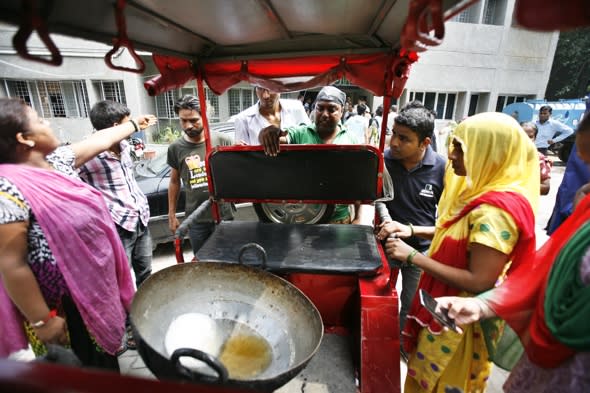 Boy dies in vat of boiling sugar syrup after rickshaw knocks him from mother's arms in India