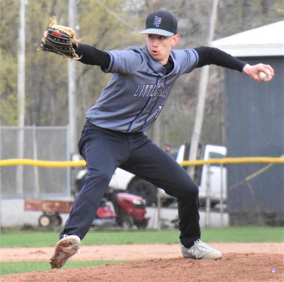 Little Falls Mountie Wyatt Beadle delivers a pitch during the seventh inning of Wednesday's game against Herkimer. Beadle pitched a scoreless inning and earned his first varsity save in a 4-2 Mounties victory.