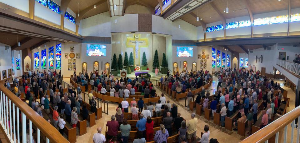 Parishioners celebrate Sunday Mass at St. Thomas More Catholic Church in Boynton Beach, Sunday, Dec. 17, 2023.