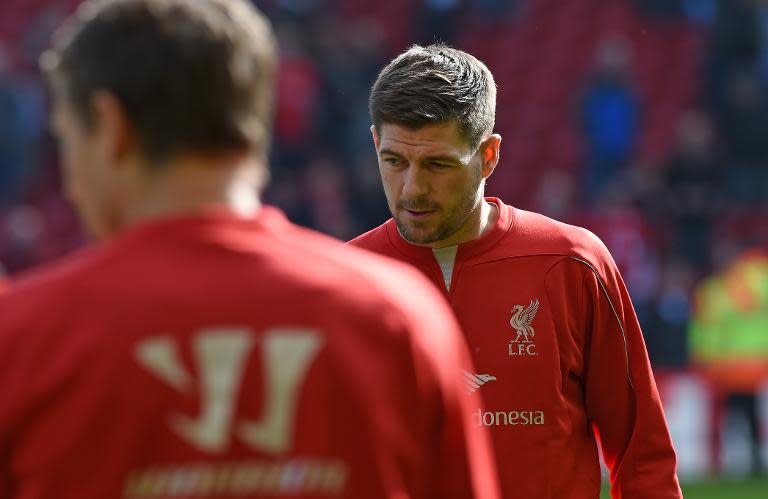 Liverpool's Steven Gerrard warms up ahead of an English Premier League match at Anfield in Liverpool, north-west England, on March 22, 2015